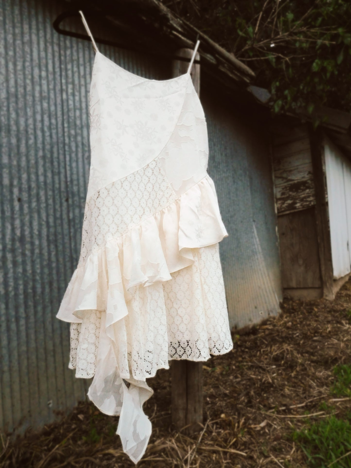 The Anniston Asymmetrical Ruffle Mini Dress